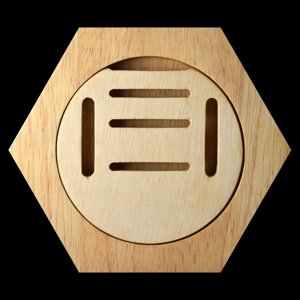 The Holder — hexagonal pine medal display, front view